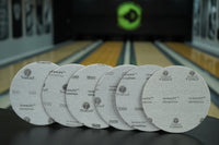 A 6 pack of 6" TruCut Sanding Pads in a bowling alley